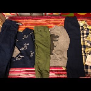 Three separate Carter’s long sleeve sets.